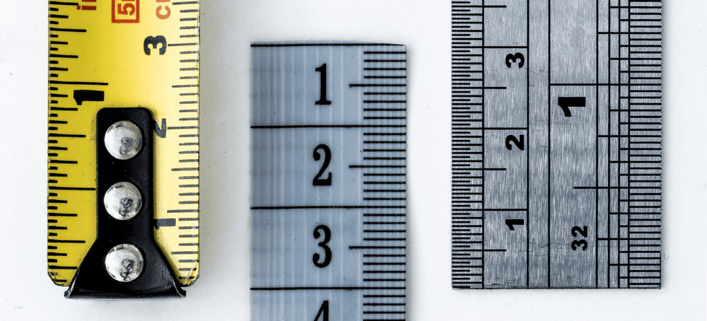 Three different rulers representing measuring the barometers of success for payment integrity