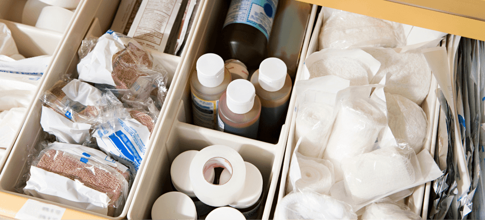 An organized drawer of medical supplies
